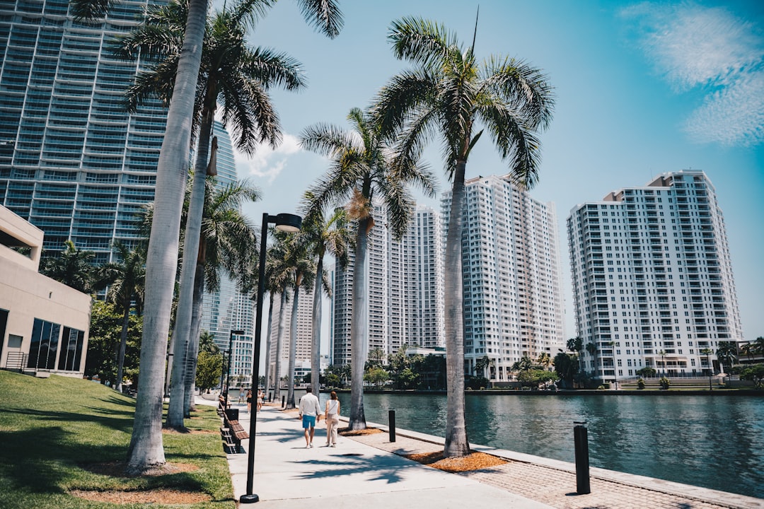 A chart-style image comparing estimated per-square-foot build cost ranges across Florida regions and finish levels