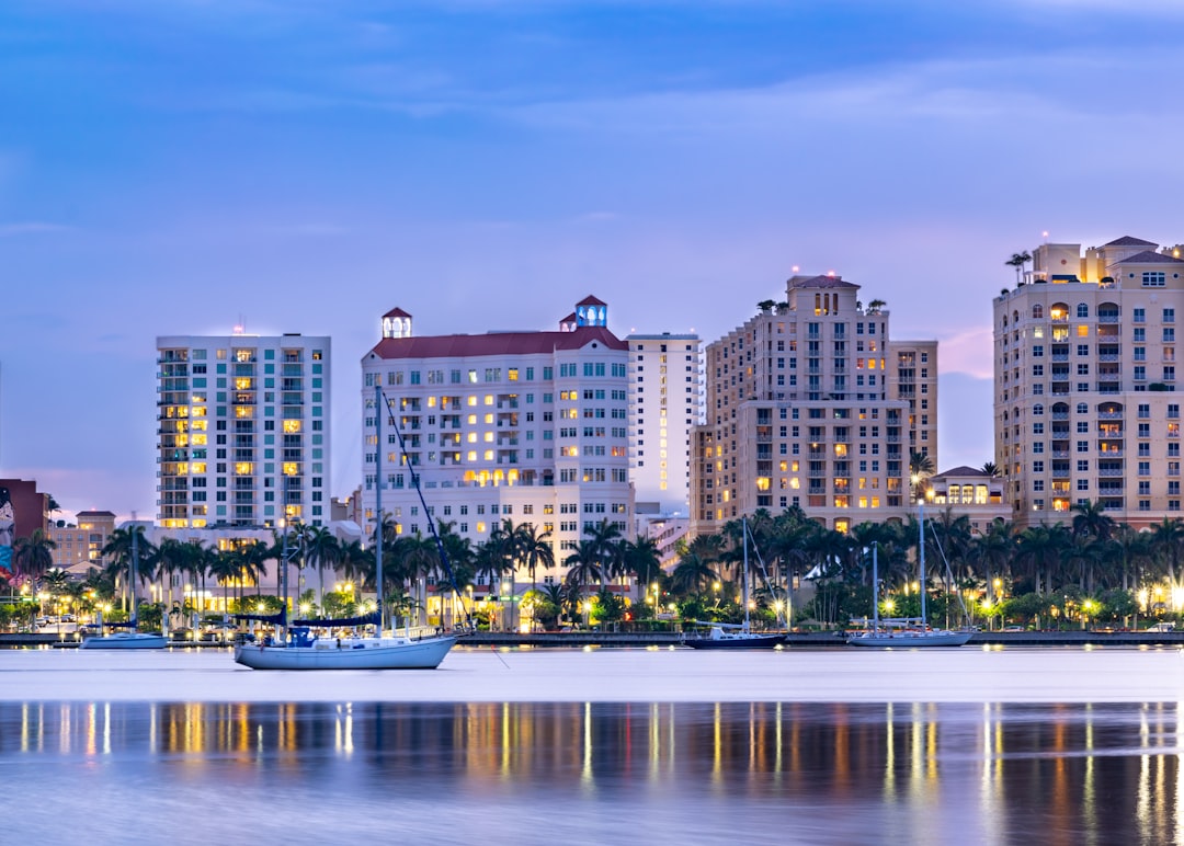 A comparison photo showing slab-on-grade versus elevated stem-wall foundations used in Florida flood zones